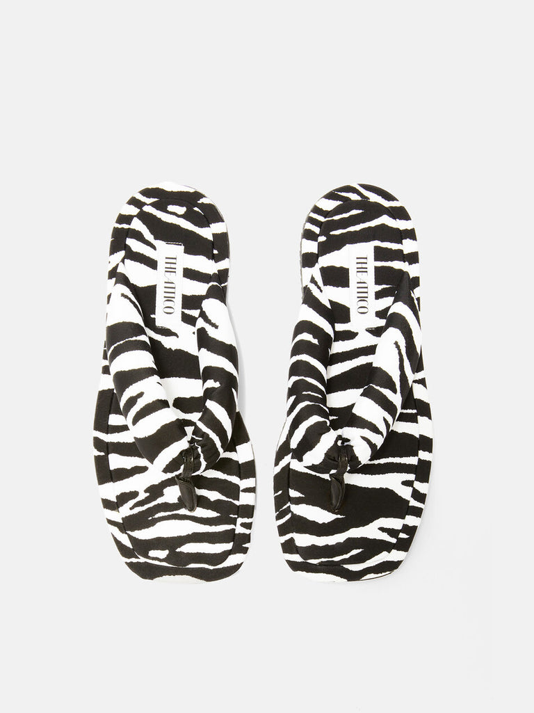 ''Indie'' white and black flat thong