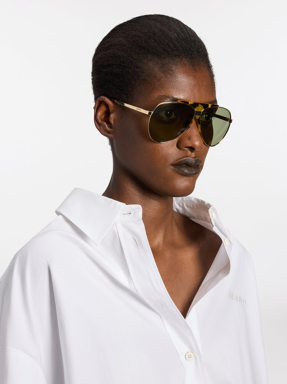 Gold and green sunglasses
